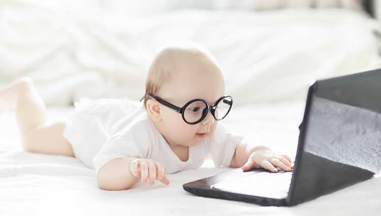 An image of a baby learning about marketing and e-marketing.