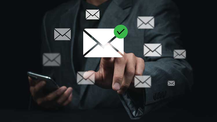Image of floating emails with finger pointing to one. Subject matter is email privacy.