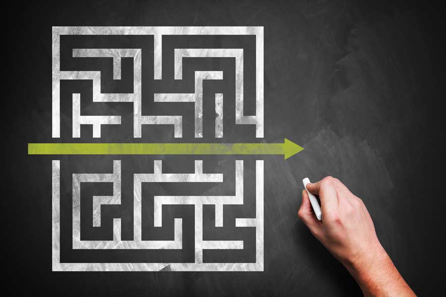 An image of a maze showing that sometimes the easiest way to get through is being more productive with your choices.