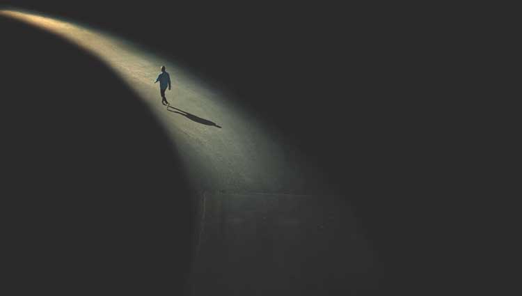 Man in a dark path depicting death