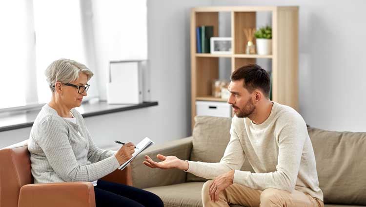 An image of a person filling out a form to change their will.