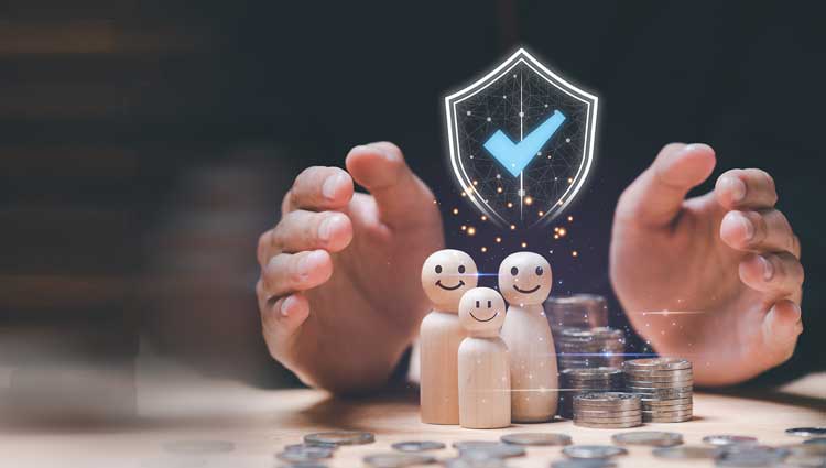Hands protecting family and wealth with a security seal above — depiction of asset protection.