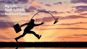 Businessman chasing a dangling carrot symbolizing fundraisers pursuing small incentives while larger legacy gifts are ignored.