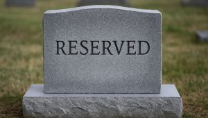 Tombstone with the letters RESERVED